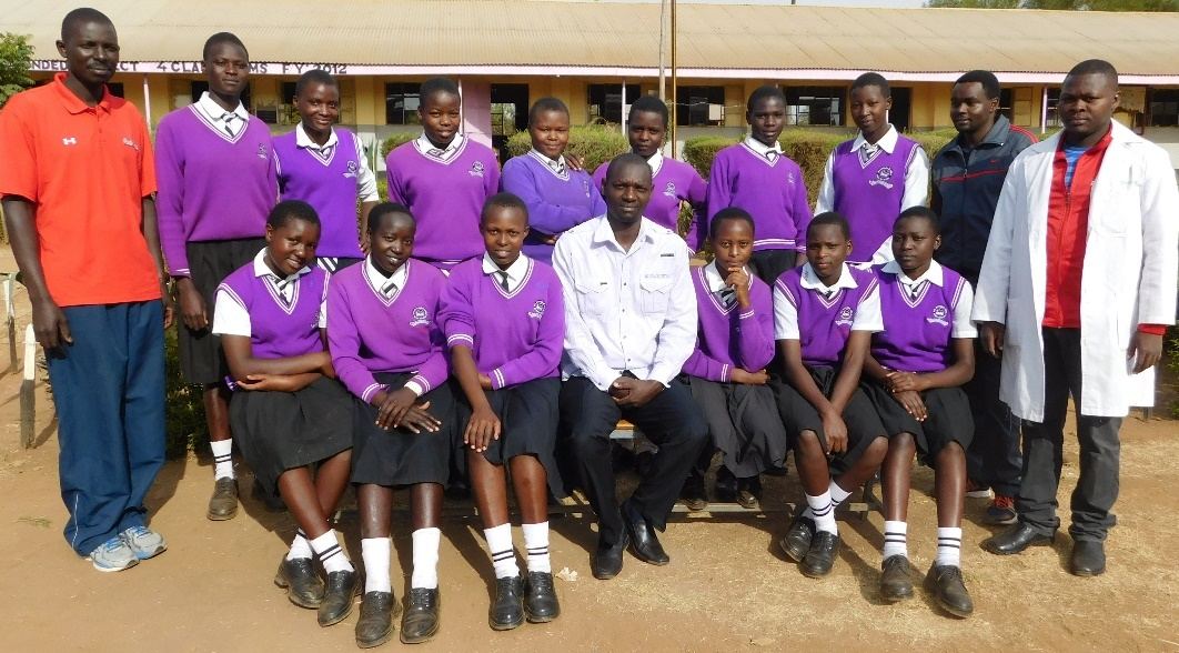 Learners in school uniform with their teachers