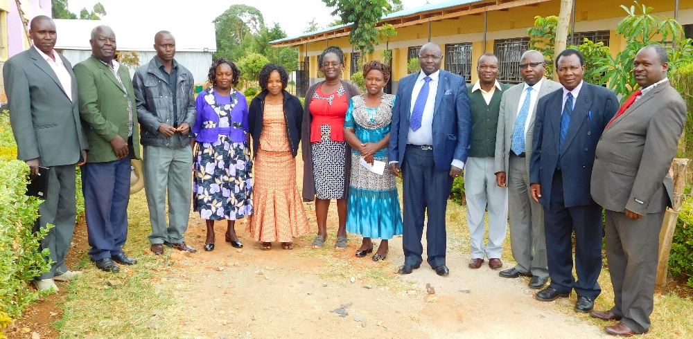 Staff and guests in a group photo